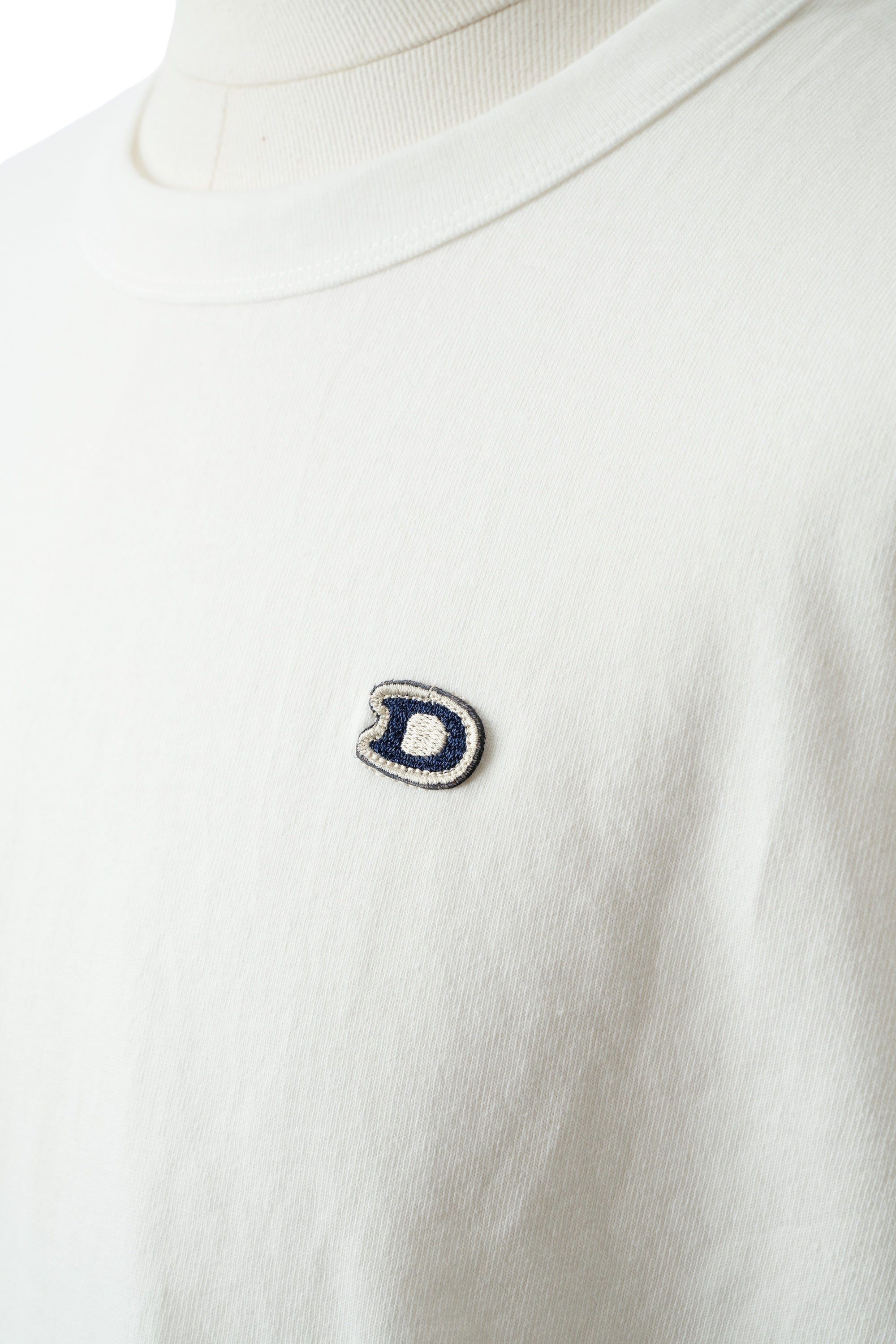 S/S U.S. Parkdale Natural White Jersey w/Dino Small Patch