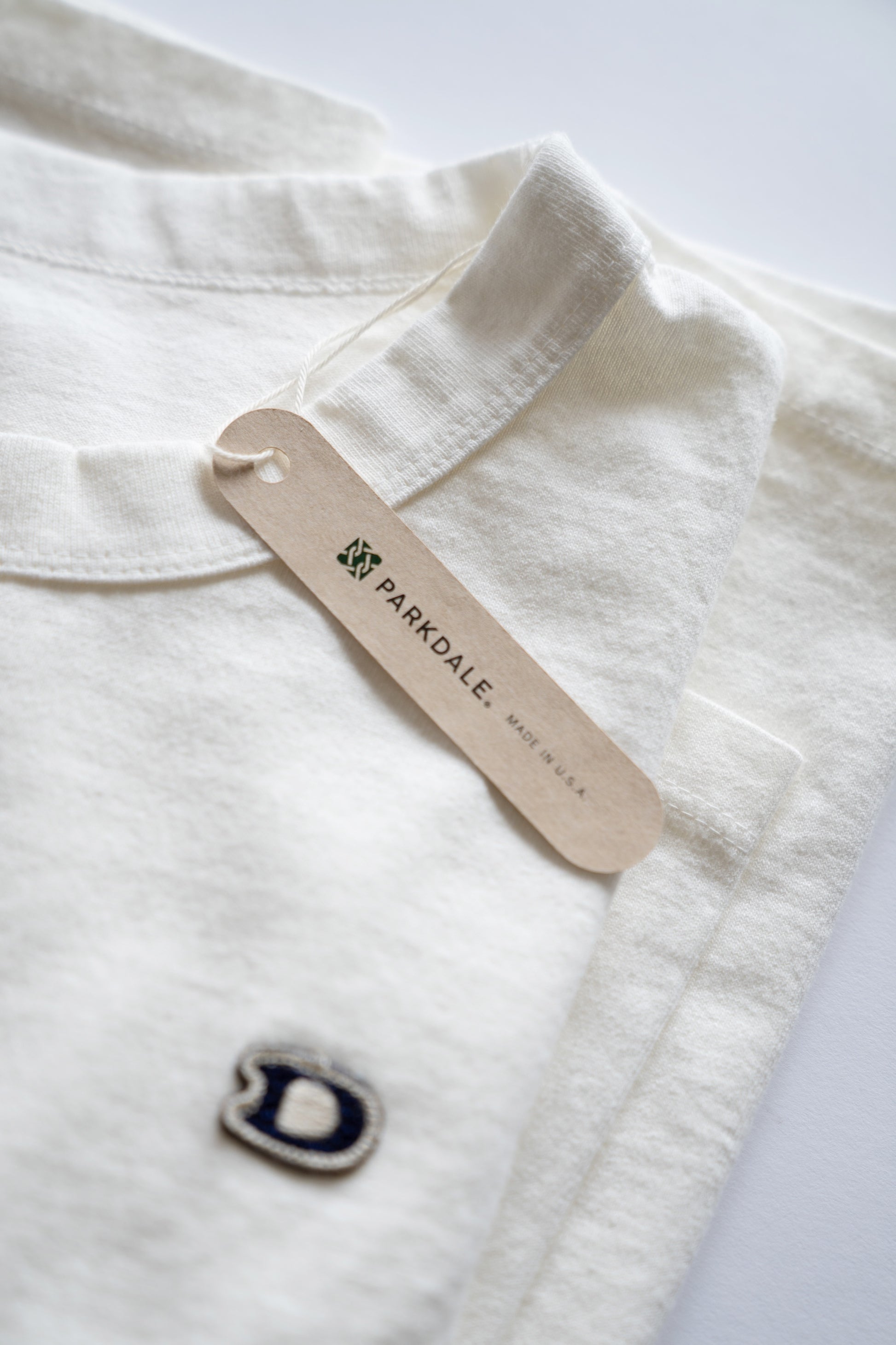 L/S U.S. Parkdale Natural White Jersey w/Dino Small Patch