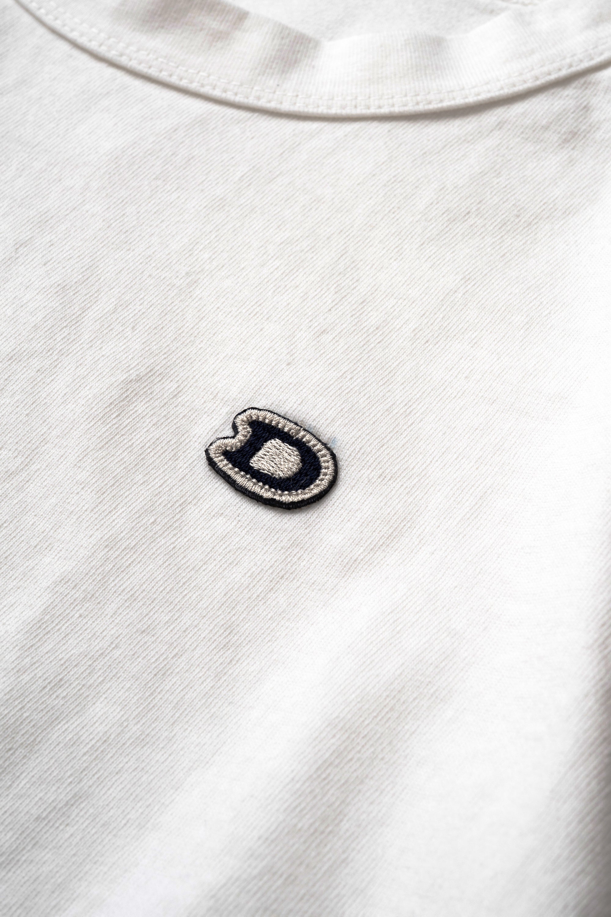 S/S U.S. Parkdale Natural White Jersey w/Dino Small Patch